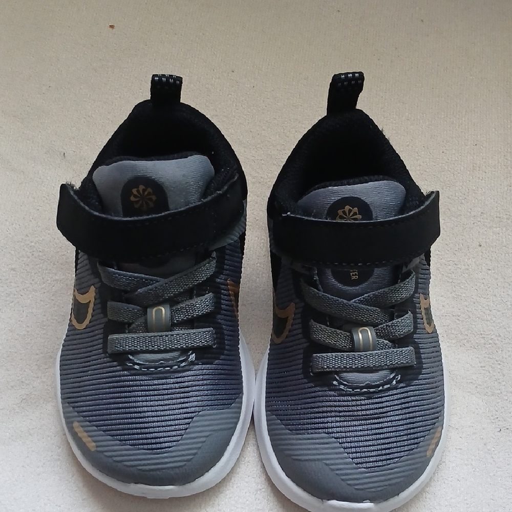 New Nike Kids Black and Gray Sneakers with Gold Accents